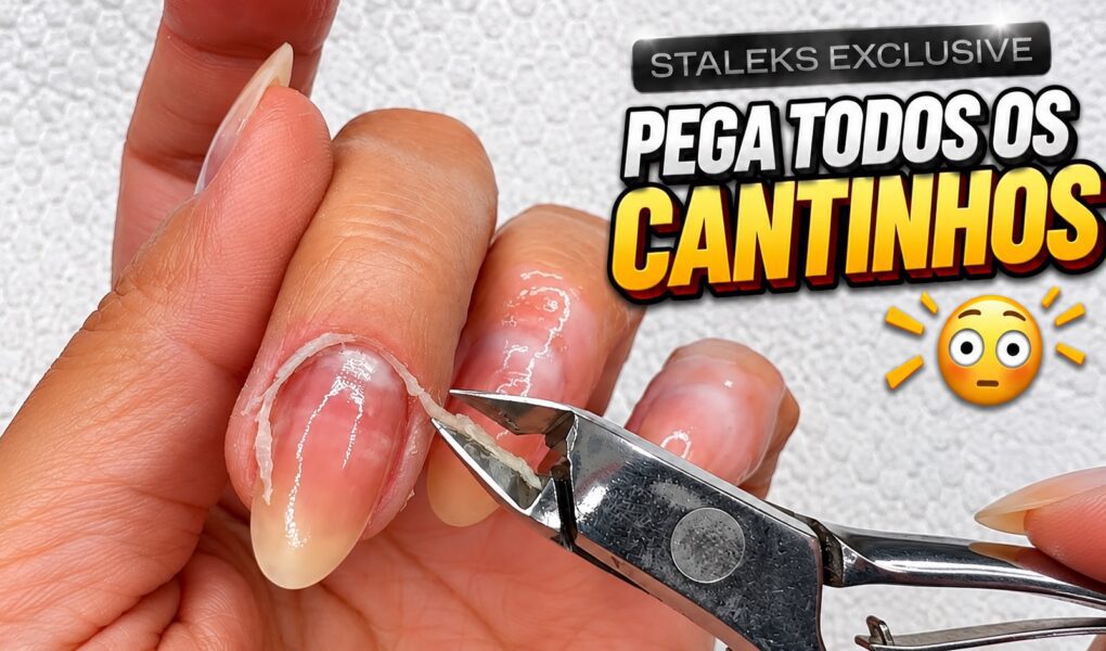 Unhas rosinhas com cutículas bem feitas e esmaltação delicada