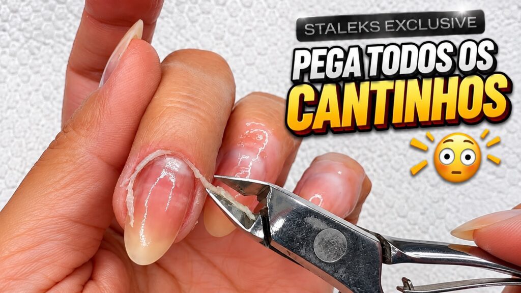 Unhas rosinhas com cutículas bem feitas e esmaltação delicada